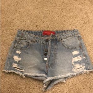 High waisted distressed shorts